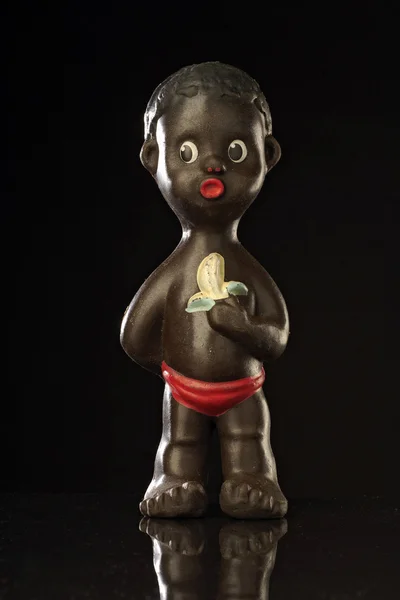 Leksak av en afrikansk pojke Stockbild