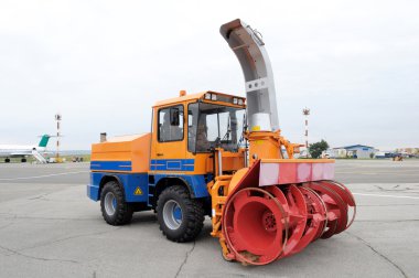 Snow plough in airport clipart