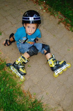 The boy fell roller skates clipart