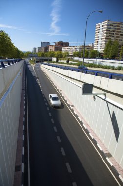 Car coming in city tunnel clipart