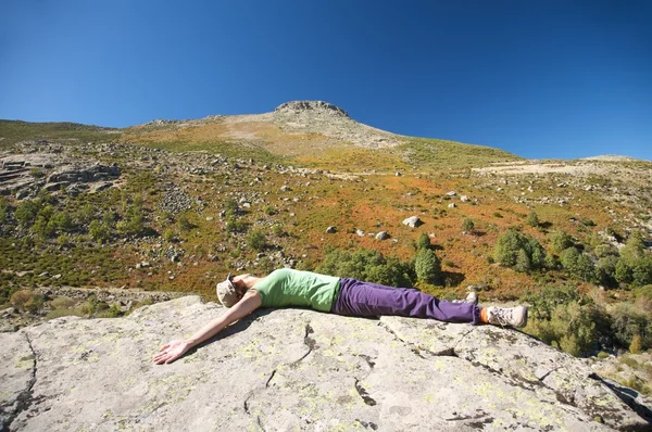 Lie down woman and peak — Stock Photo, Image