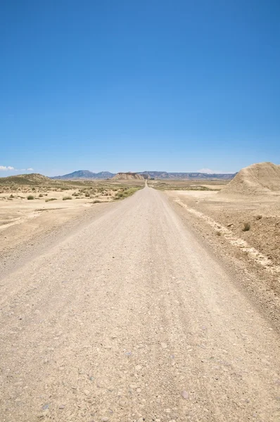 Long desert road — Stock Photo, Image