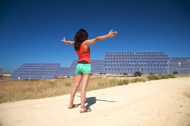 Red woman greeting solar panels clipart