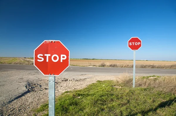 Pair of stop traffic signs — Stock Photo, Image