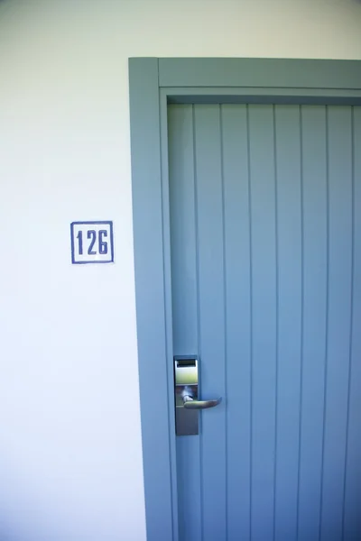 Drzwi z numerem — Zdjęcie stockowe