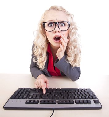 Shocked office worker at a computer clipart