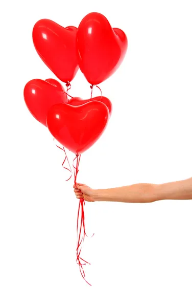 Balões coração mão segurando — Fotografia de Stock