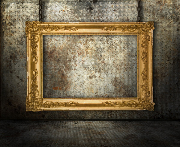 Grunge interior with gold frame