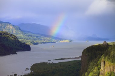 Rainbow in the Columbia Gorge Oregon. clipart