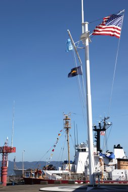 US coast guard ship & marine moment, Astoria Oregon. clipart