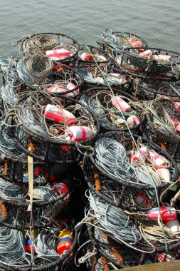 Crab traps stacked, port of Astoria OR. clipart