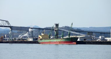 Cargo ship & the port of Longview WA. clipart