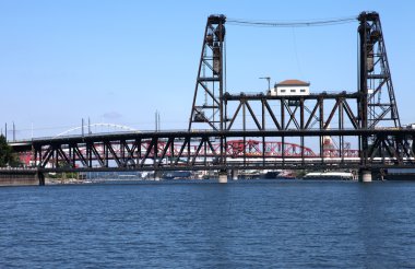The steel bridge a busy thoroughfare, Portland OR. clipart