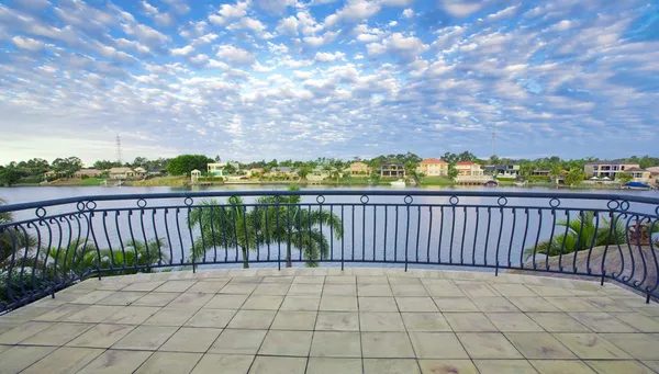 Balcony views from waterfront Mansion overlooking the canal — Stock Photo, Image
