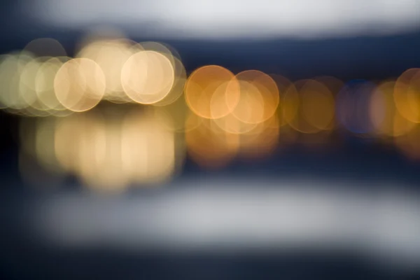 Abstraktní město světel v noci mimo zaměření — Stock fotografie