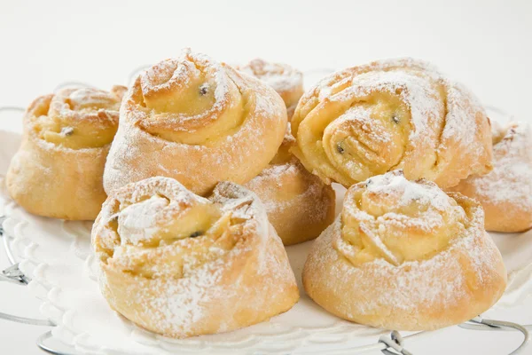 Sweet Savoury buns with white icing — Stock Photo, Image