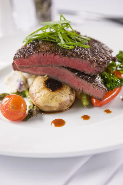 Steak with mushrooms and potato bake — Stock Photo, Image