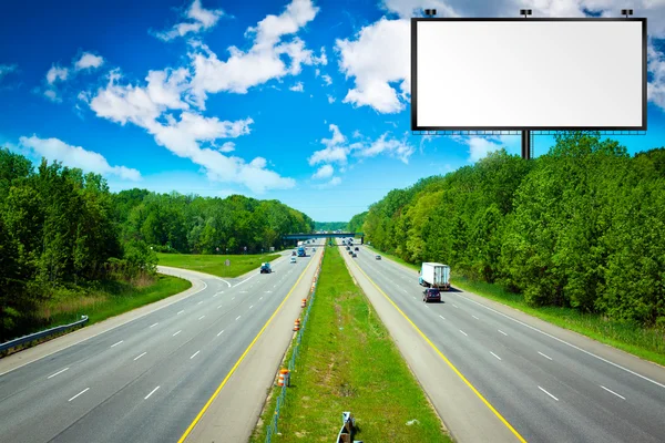 Billboard s bouřlivá obloha na americké mýtného způsobem — Stock fotografie