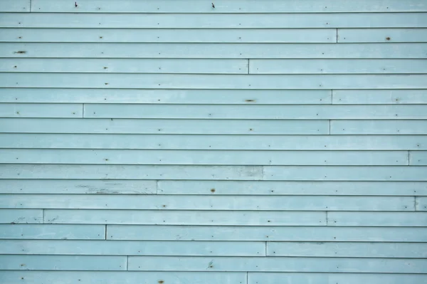 Зрізати синій паркан на старому будинку . — стокове фото