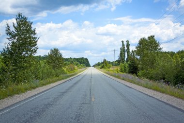 gün batımında Amerikan country road