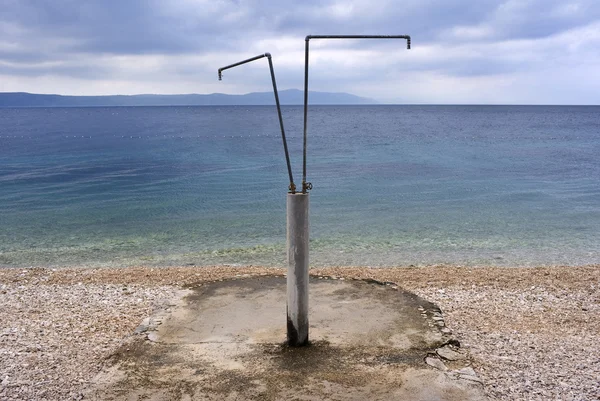 シャワー付きのビーチ — ストック写真