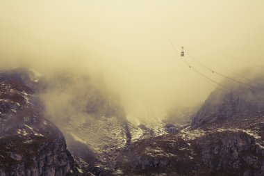 Cable car in Dolomites clipart