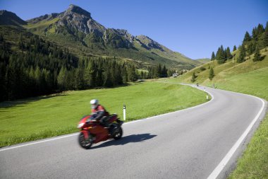 Biking in the Dolomites clipart