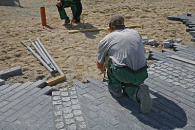 Pavers on job clipart