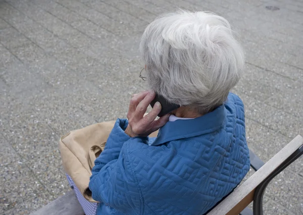 Senior talking mobile — Stock Photo, Image