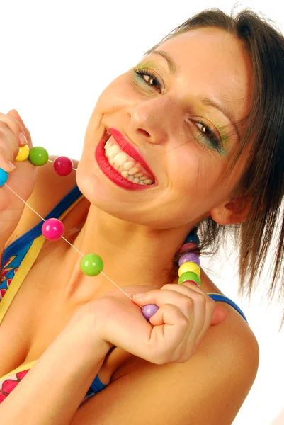 Vacker flicka med färgglada halsband — Stockfoto