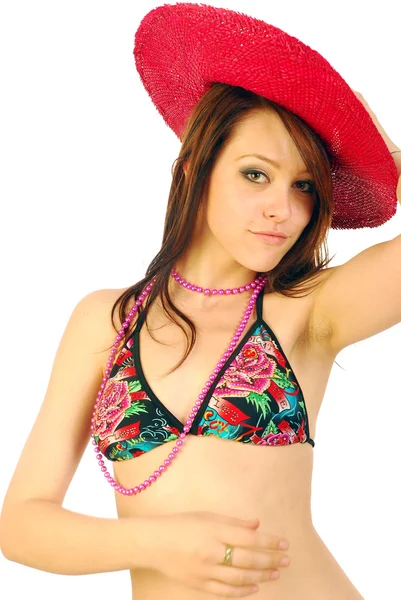 Menina sexy bonita em um maiô com chapéu vermelho — Fotografia de Stock