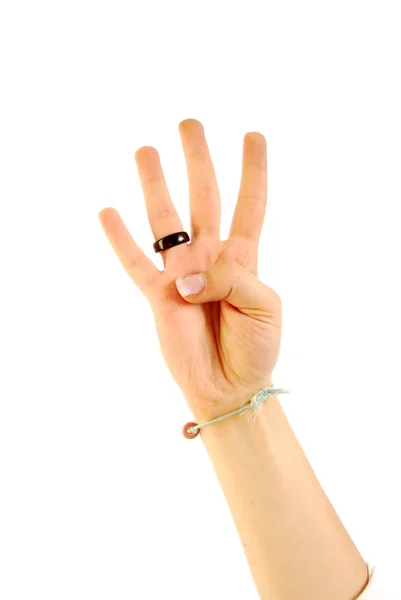La mano de la mujer es el número cuatro — Foto de Stock