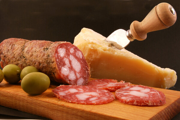 Salami with green olives and parmesan cheese