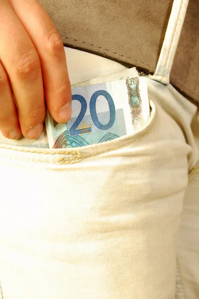 Tjugo euro i jeans pocketventi euro — Stockfoto