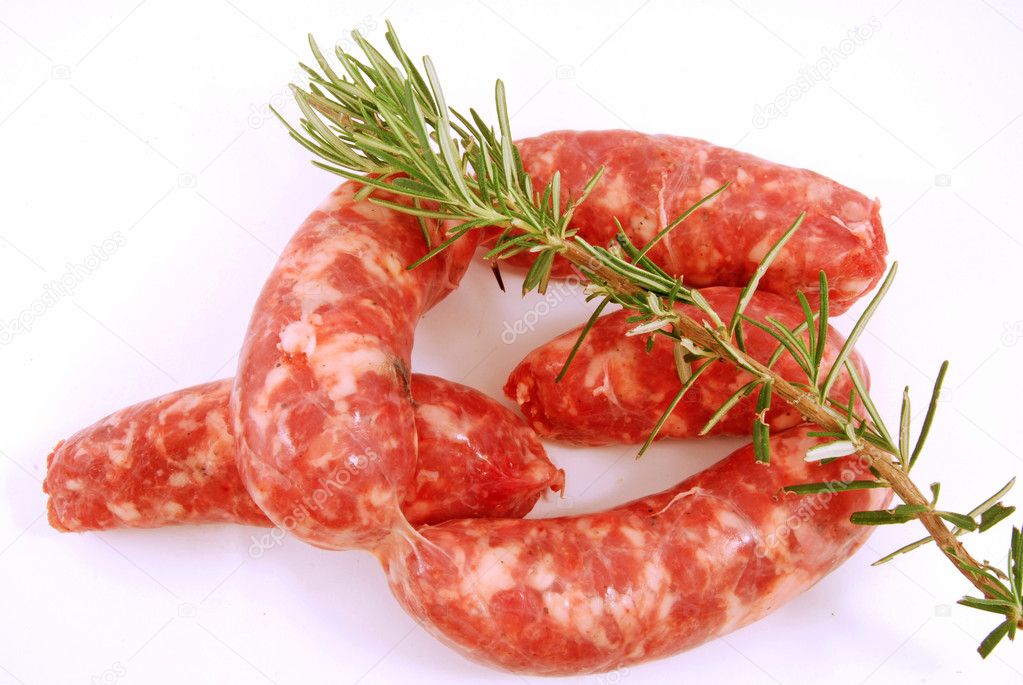 Set sausages ready to be cooked with rosemary
