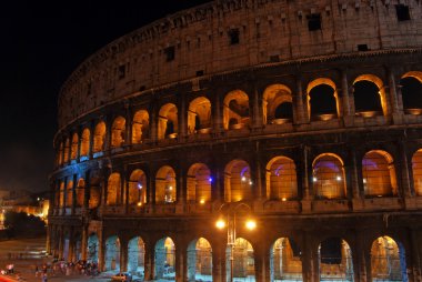 Rome and the Colosseum at night clipart