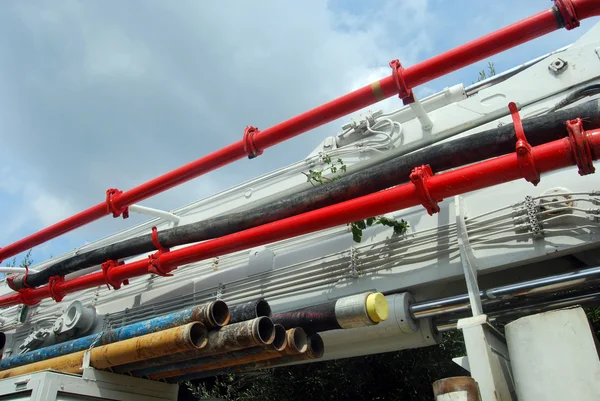 stock image The impressive mechanisms of a concrete pump truck