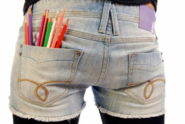 Colored pencils in the pocket of Jeans clipart