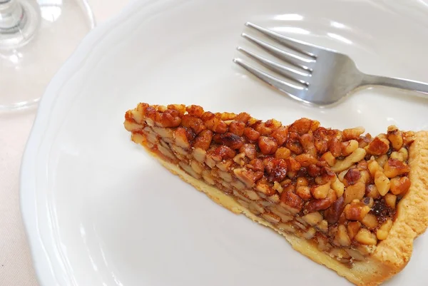 Slice of hazel nut tart — Stock Photo, Image