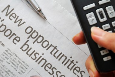 Closeup on new opportunities text and hand phone clipart