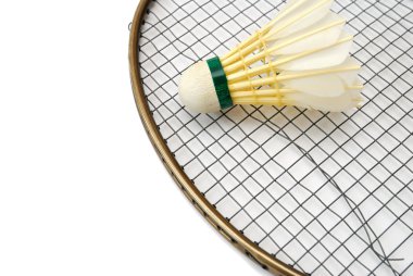 Shuttlecock on broken badminton racket clipart