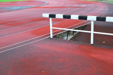 Hurdle on running track clipart