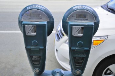 Two car park meters clipart