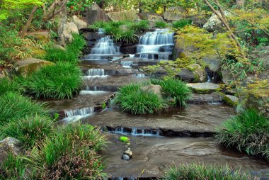 Waterfall in a Japanese zen garden clipart