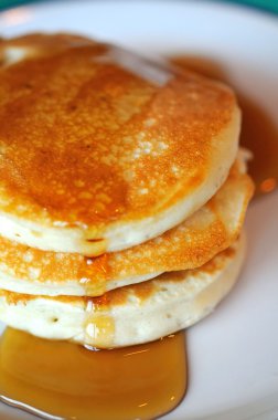 Pancakes with maple sauce clipart