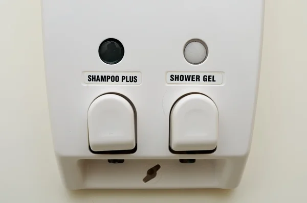 Closeup of hair soap dispenser — Stock Photo, Image