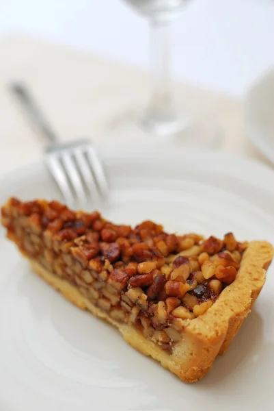 Slice of hazel nut tart — Stock Photo, Image