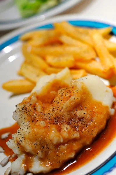 Mashed potato with sauce — Stock Photo, Image