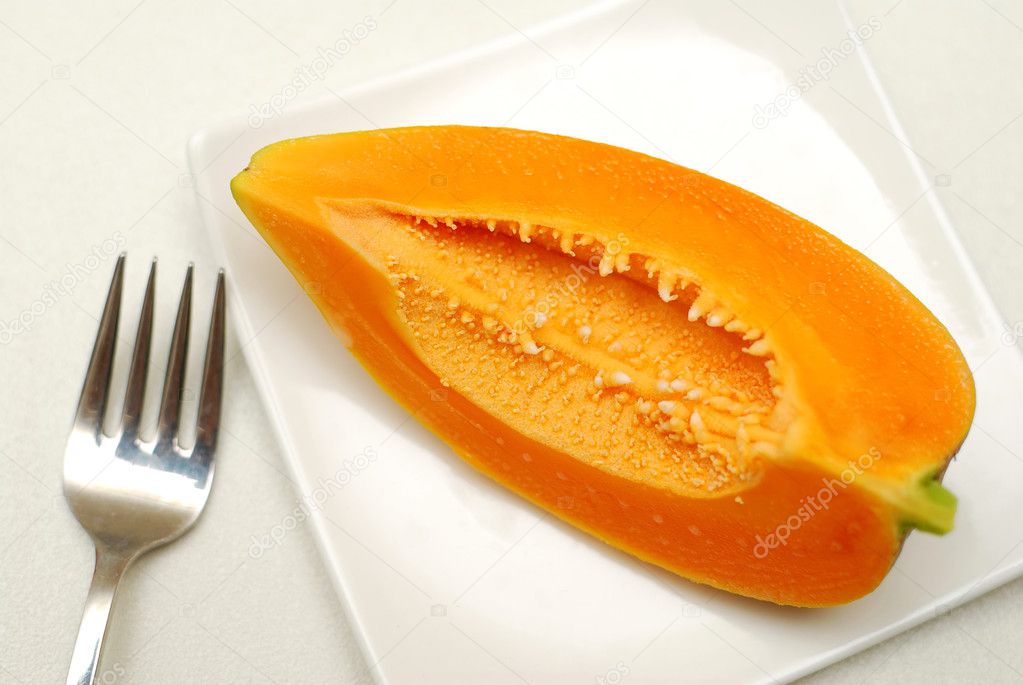 Healthy slice of papaya fruit