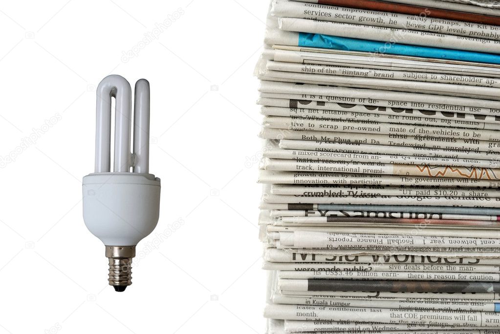 Light bulb and new newspapers